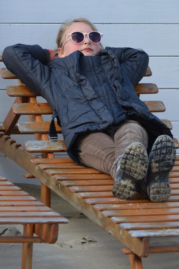 child, girl, to enjoy, lounger, coat, people, sunglasses, relax, relaxation, to rest, rest